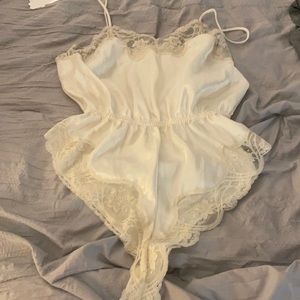 Hidden fantasies vintage body suit. Size L